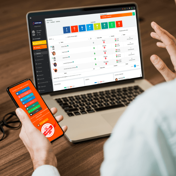 pessoa em seu escritório com notebook e celular na mão com imagens de dados de pessoas conectadas no hotspot social simbolizando hotspot o que é